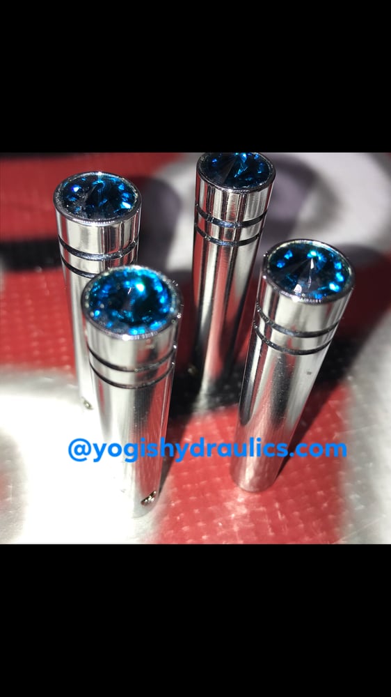 Image of Teal jeweled switch extensions