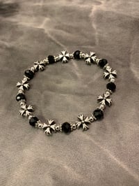 Image 1 of Silver and black cross stretch bracelet