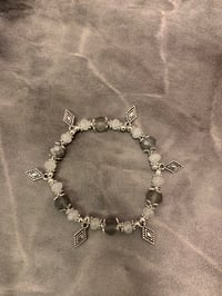 Image 2 of Gray white and silver tone stretch bracelet with diamond shape charms