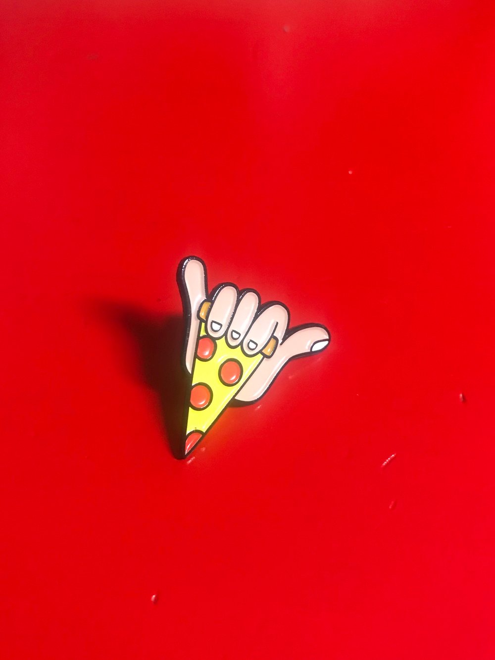 Image of Shaka Slice lapel pin