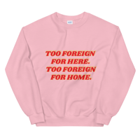 Image 1 of 'Too foreign for here' sweater