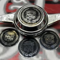 Image 1 of Black & chrome Cadillac chips 