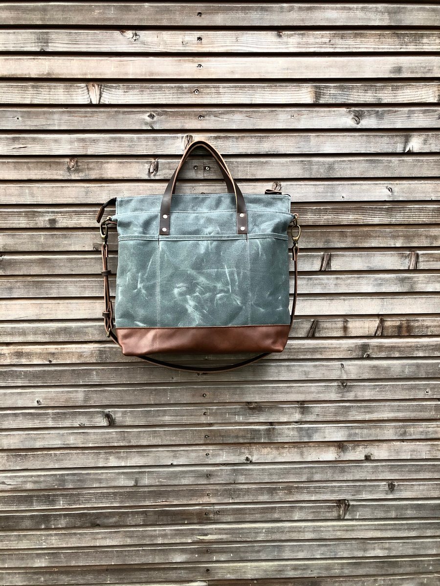 Image of Waxed canvas office bag with luggage handle attachment leather handles and shoulder strap