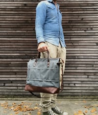 Image 3 of Waxed canvas office bag with luggage handle attachment leather handles and shoulder strap