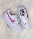 Image of Swarovski Nike Air Force 1 White customized with Pink SWAROVSKI® Xirius Rose-Cut Crystals.