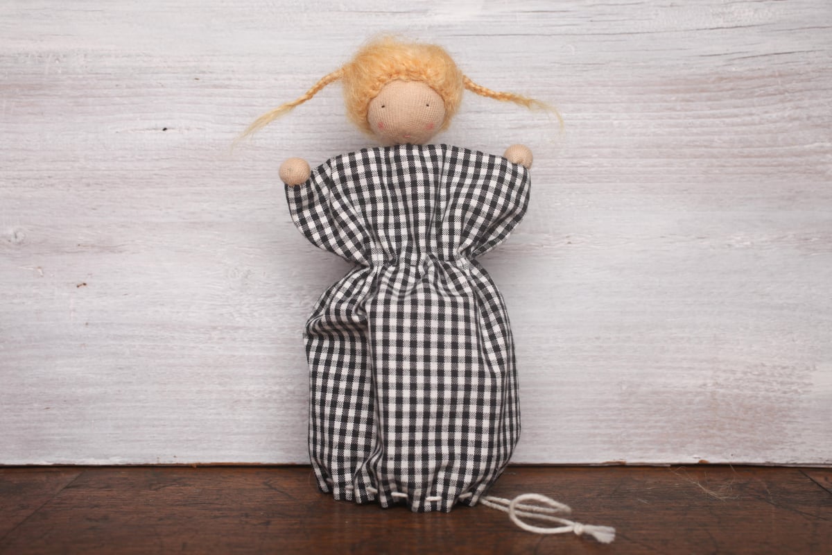 Image of DOLL IN THE BAG