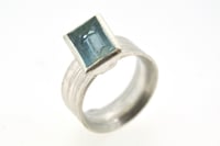 Image 1 of Silver Strata ring with mirror cut aquamarine