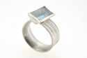 Silver Strata ring with mirror cut aquamarine