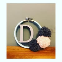 Pom Pom letter wall hanging