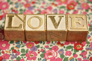 Image of LOVE set of gilded letter blocks