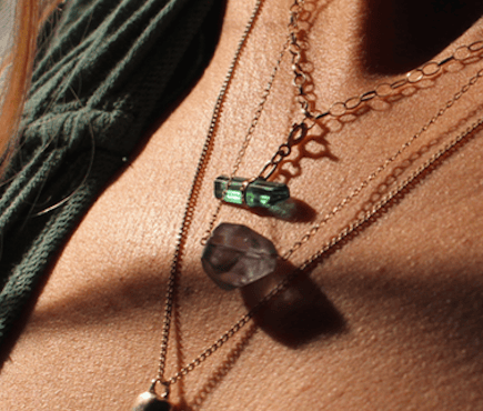 Image of Balance necklace. Green tourmaline set in 9ct gold. 