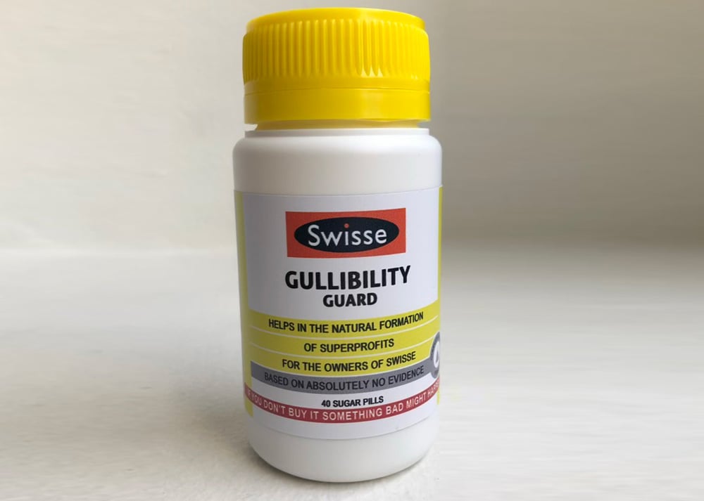 Image of Swisse 'Gullibility Guard' with FREE bottle of 'Help you choose between all the fucking vitamins'