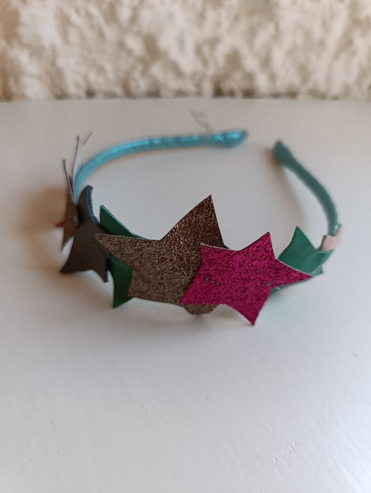 Image of Cerchietto stelle imperfette centrali colori mix