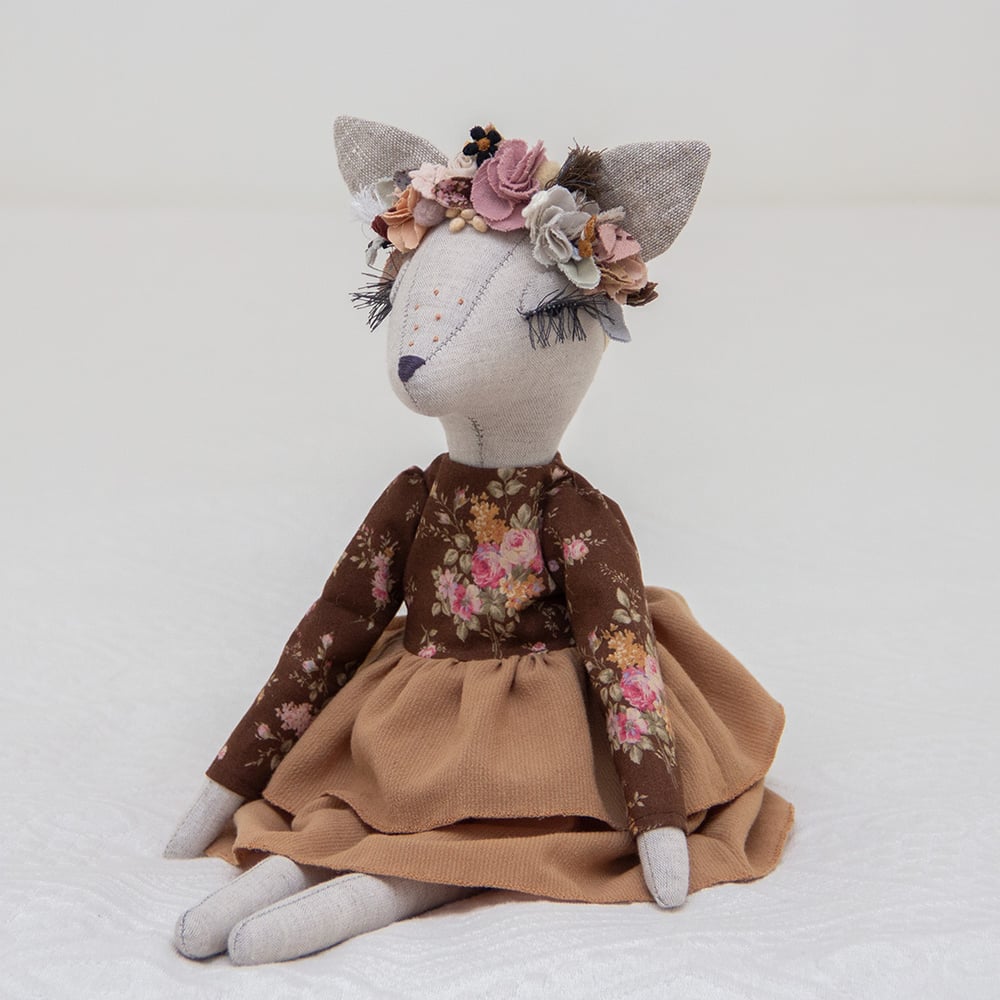 Image of Boho Deer heirloom doll with a brown floral dress