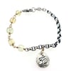 prehnite and sterling silver bracelet . om charm bracelet