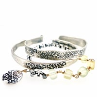 Image 5 of prehnite and sterling silver bracelet . om charm bracelet