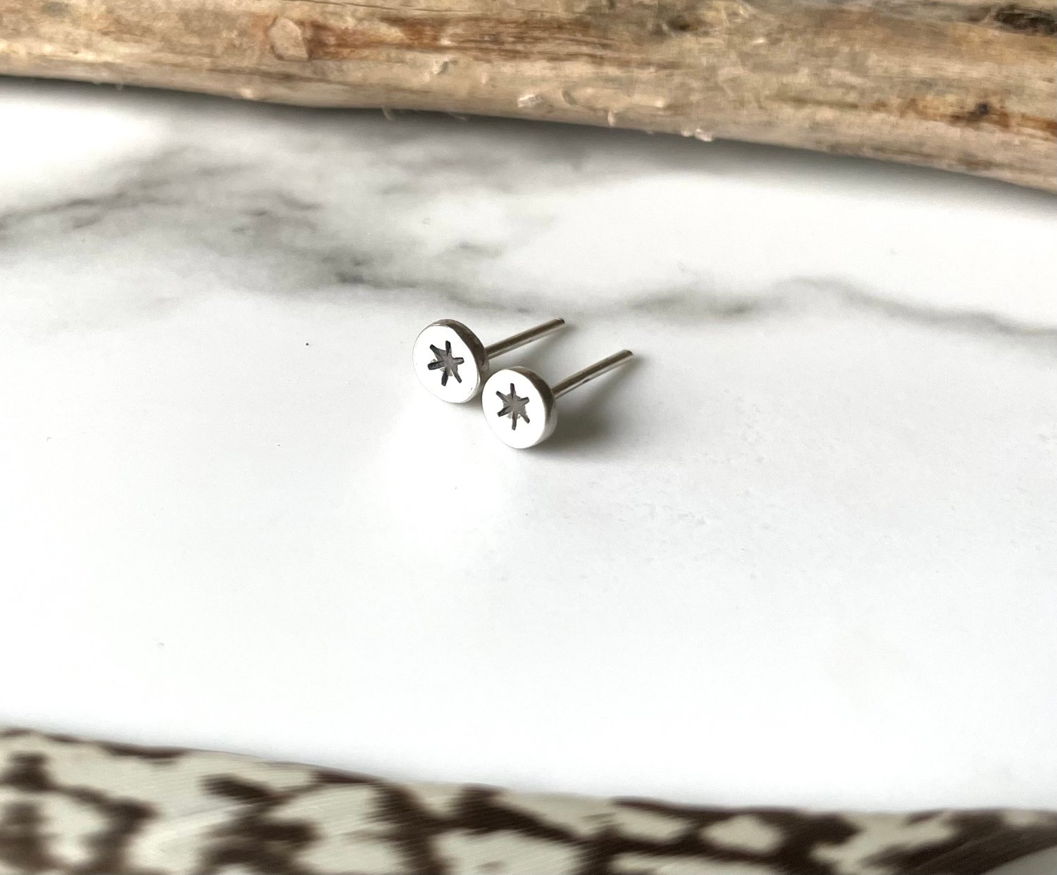 Image of Handmade sterling silver stamped star stud earrings. Tiny star studs 925 silver.
