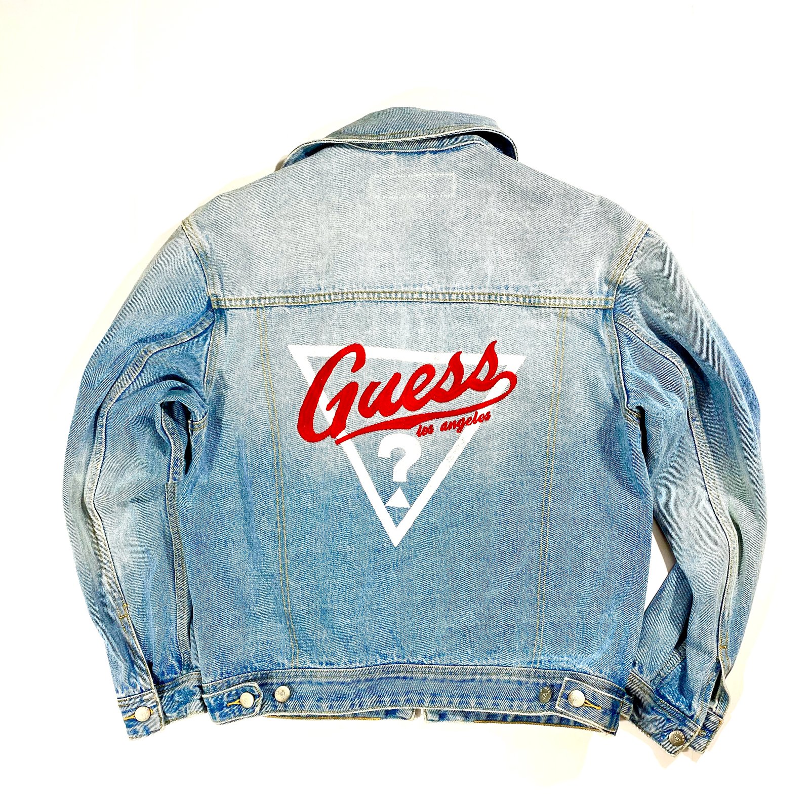 guess denim jacket logo on back