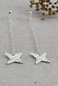 Image 1 of Dangly stars earring 
