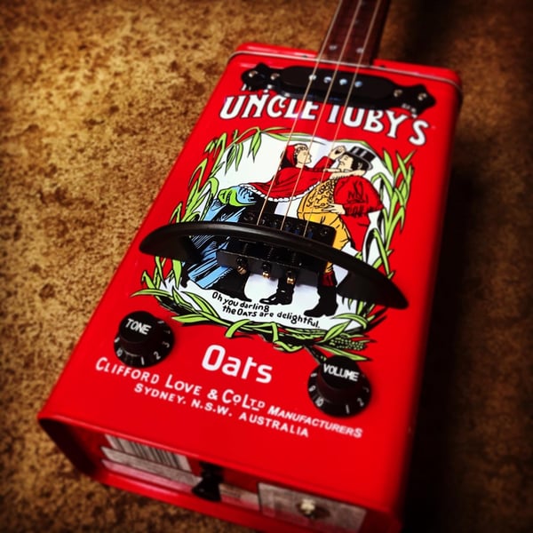 Image of Uncle Toby's Oats Tin Guitar