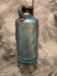 Image 4 of Cross altered bottle, blue bronze and black with beaded fringe. Night light .