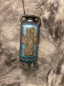 Image of Cross altered bottle, blue bronze and black with beaded fringe. Night light .
