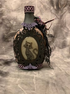 Image of Altered skeleton cat bottle, night light .