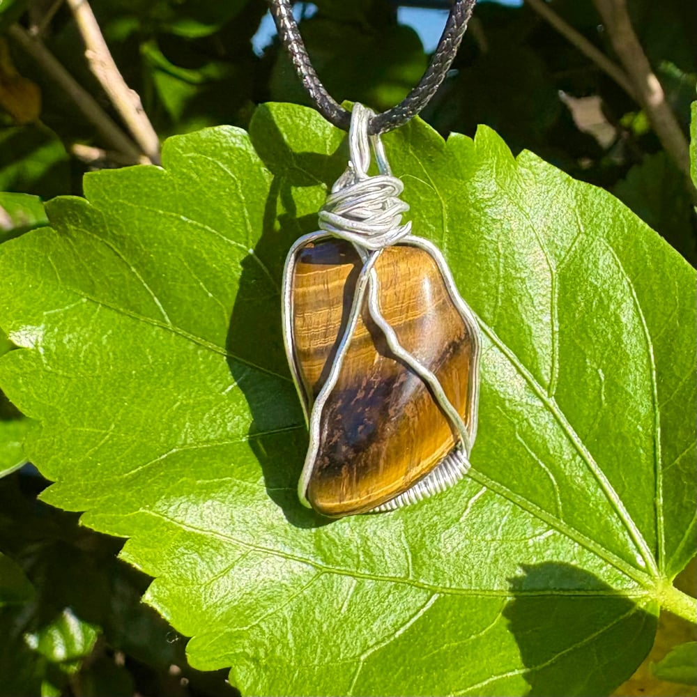 Image of tiger’s eye pendant c