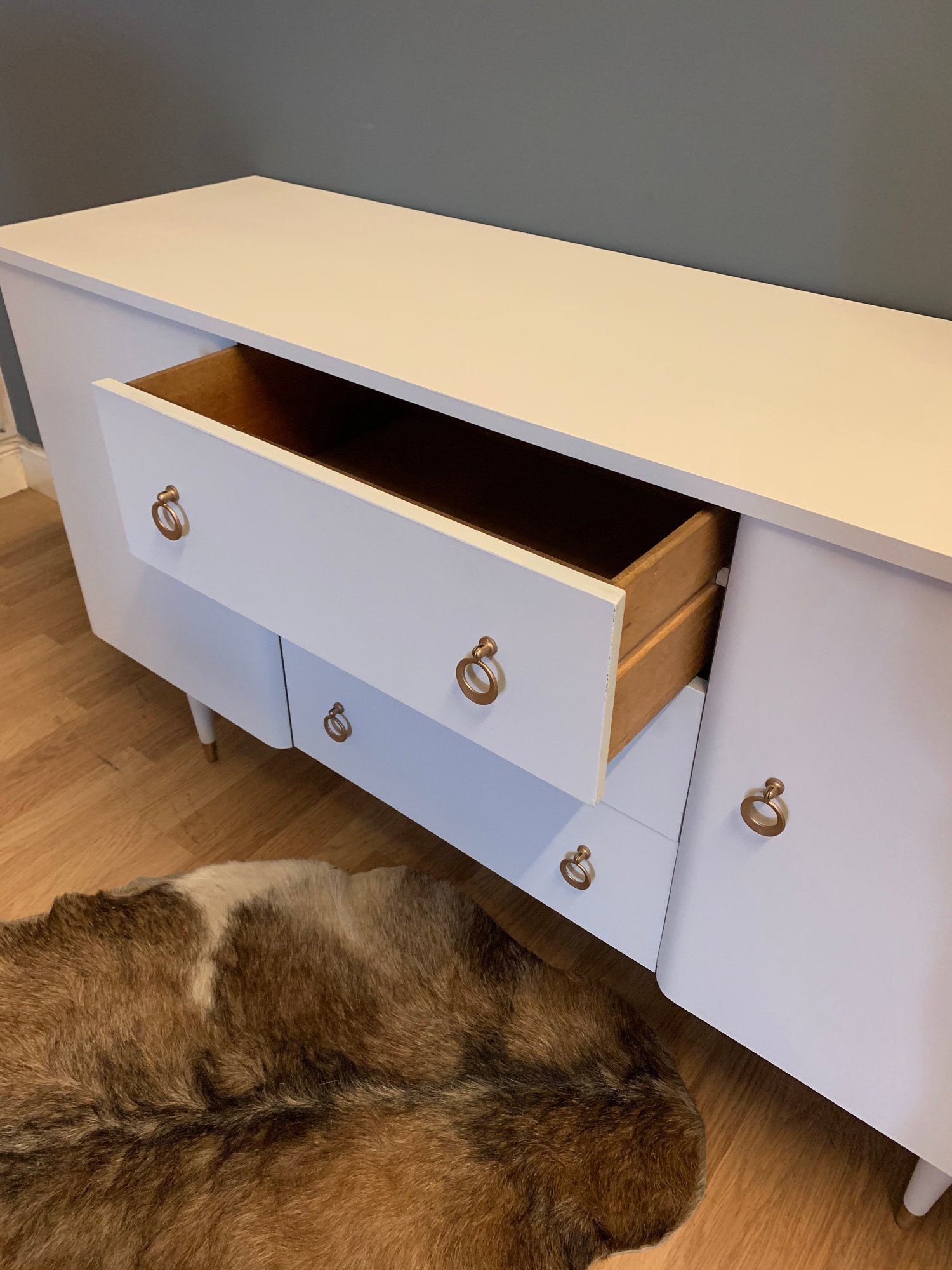 Image of Gold & white sideboard