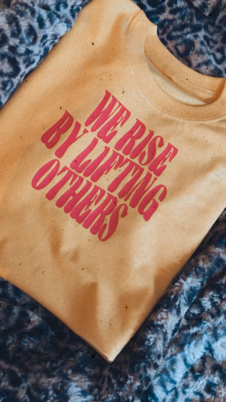 Image of We rise by lifting others tee 