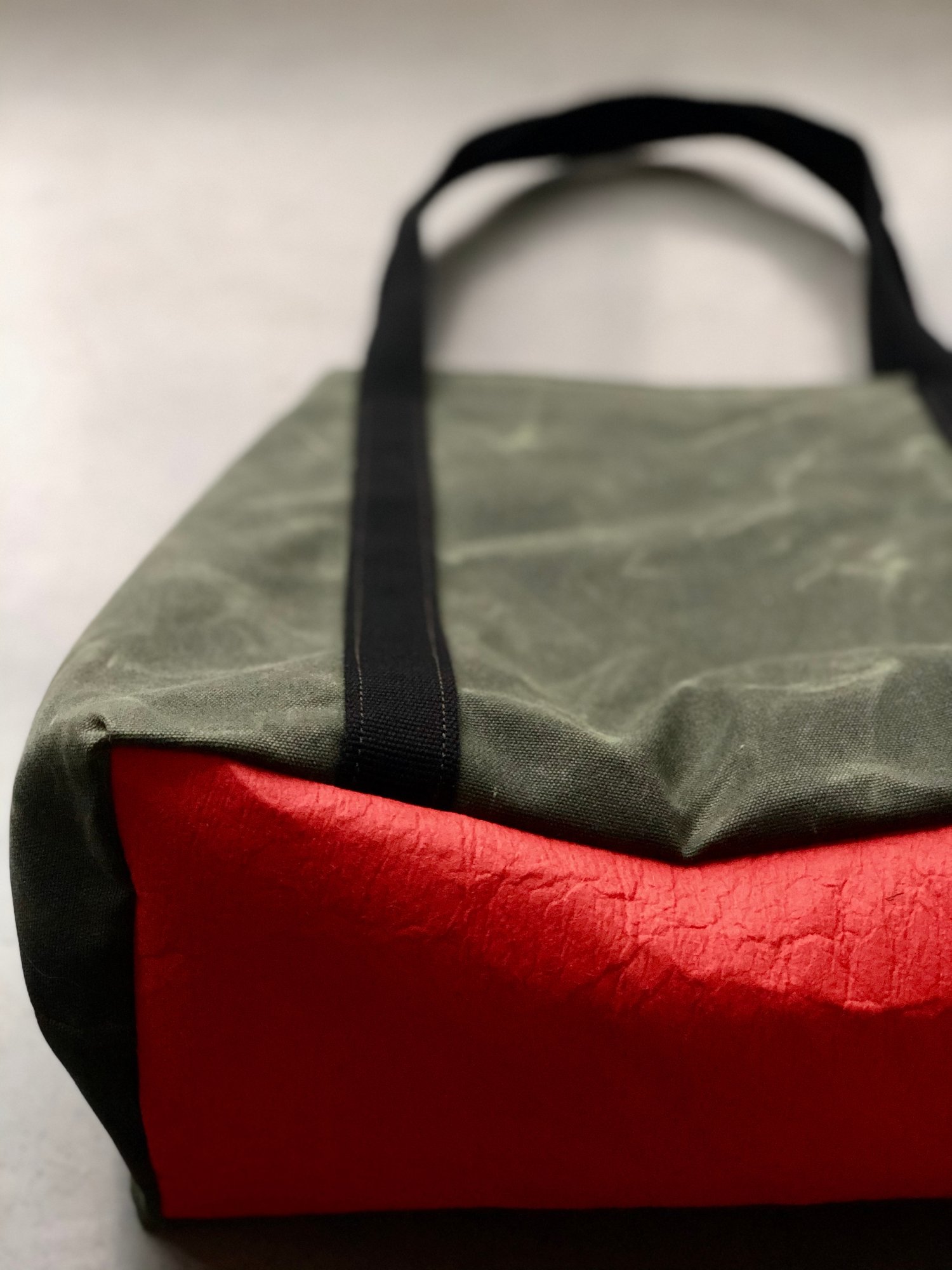 Image of Large vegan tote bag in olive green waxed canvas with bottom in Piñatex™ bucket tote bag