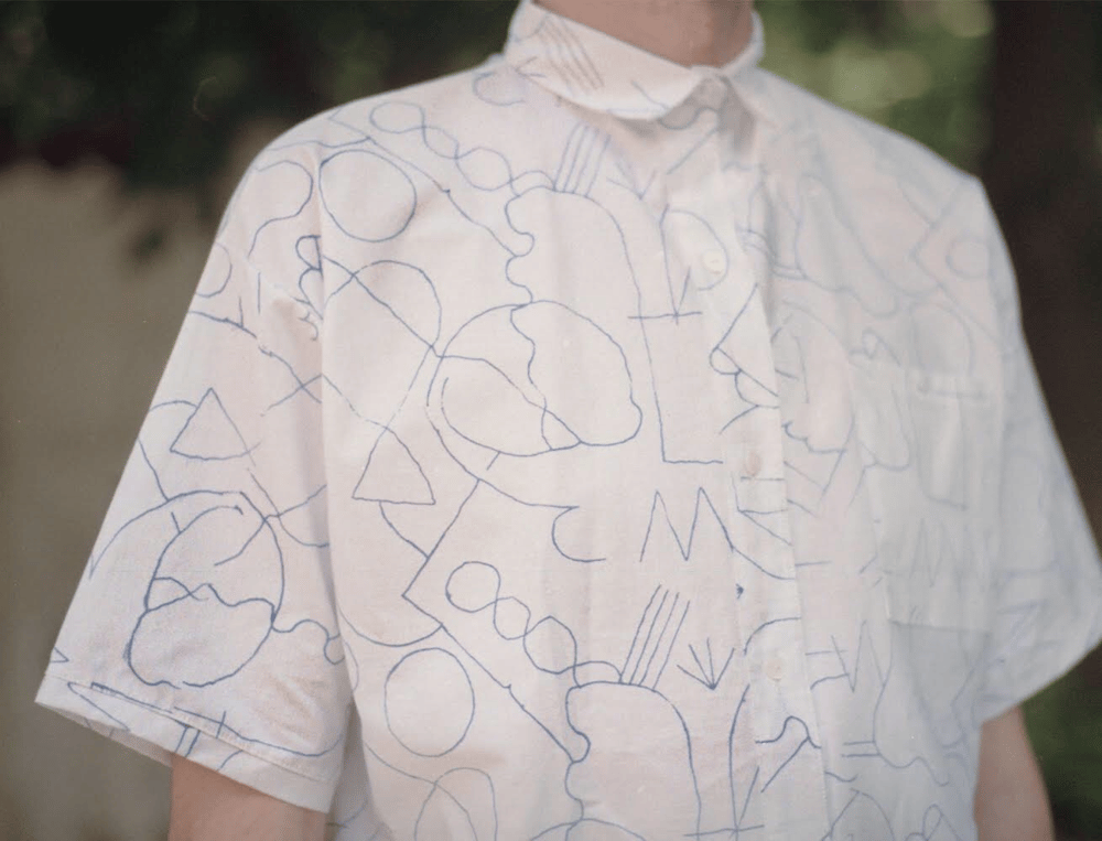 Image of LINE DRAWING WHITE SHIRT