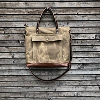 Image 1 of Briefcase in waxed filter twill with outside pocket  - Satchel with luggage handle attachment