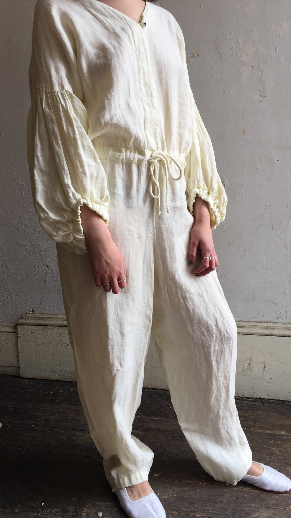 Black crane linen jumpsuit on sale