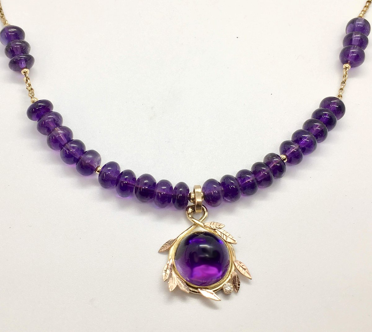 Image of Amethyst, diamond, gold necklace