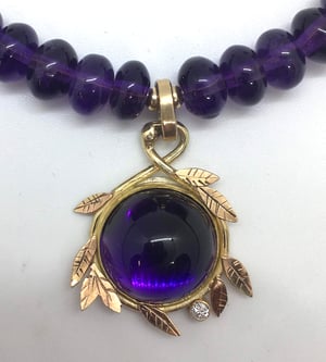 Image of Amethyst, diamond, gold necklace