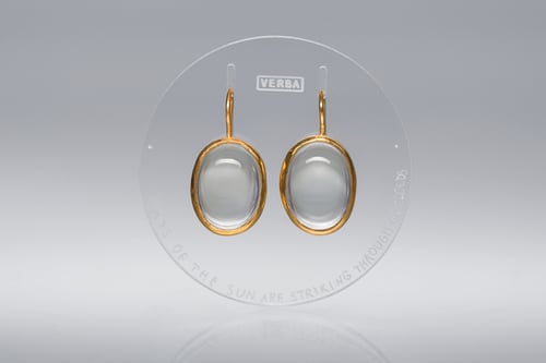 Image of "Rays of sun are striking.." gold plated silver earrings with rock crystals · RADII SE INTER.. ·