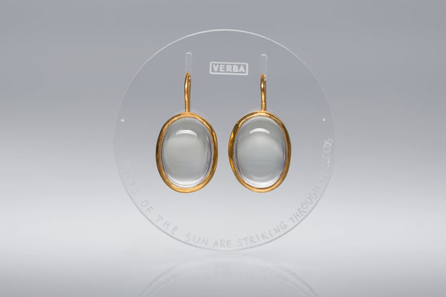 Image of "Rays of sun are striking.." gold plated silver earrings with rock crystals · RADII SE INTER.. ·