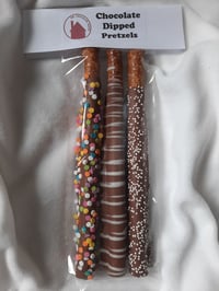Image 1 of Chocolate dipped pretzels seasonal variations available