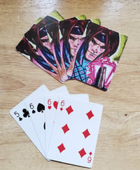 Image of Character playing cards