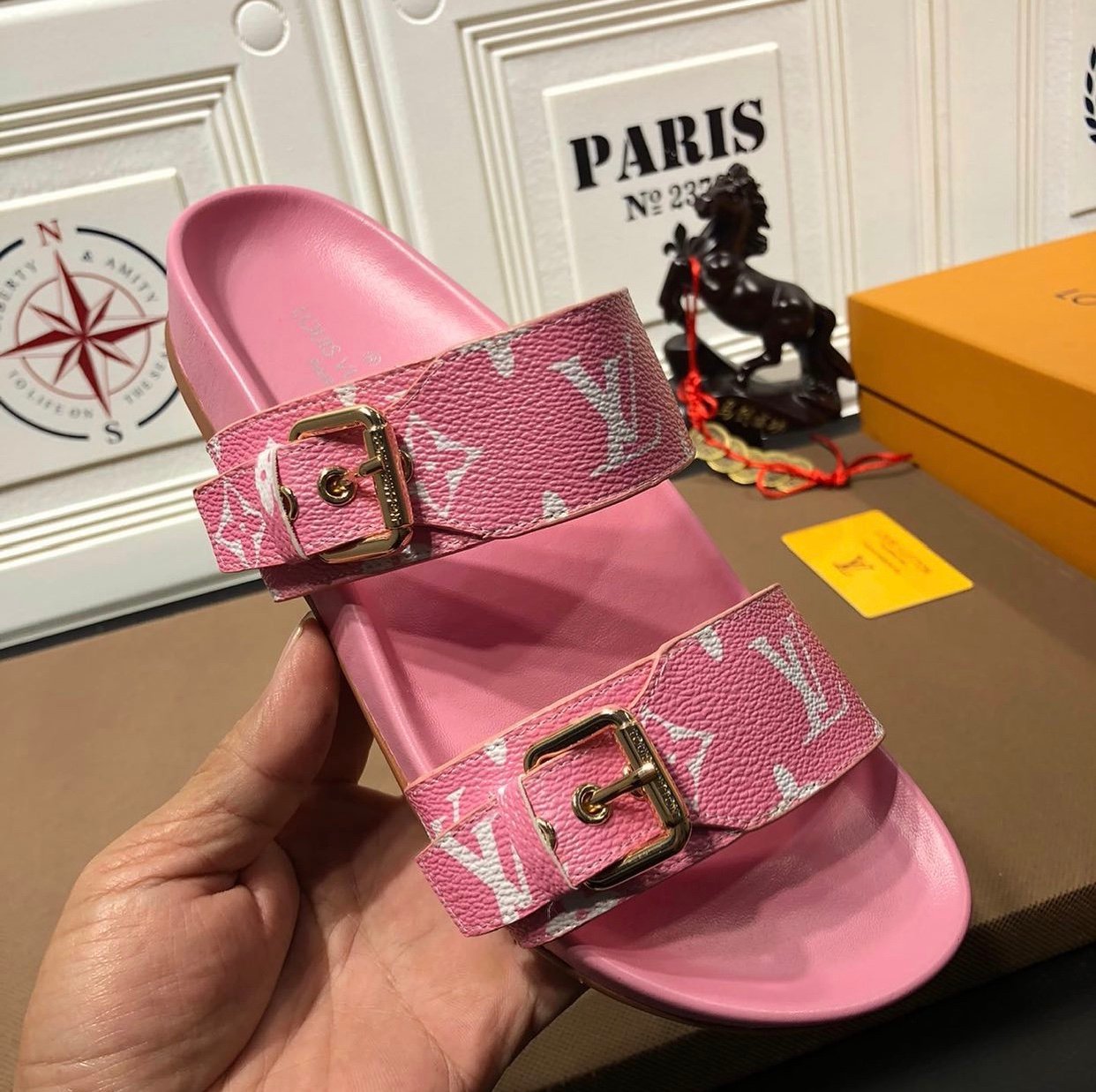 pink and red louis vuitton slides