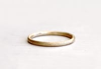 Image 1 of A simple wedding ring. Earthy love. Ford