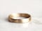 Image of A rustic gold wedding band. 18k. Lulu