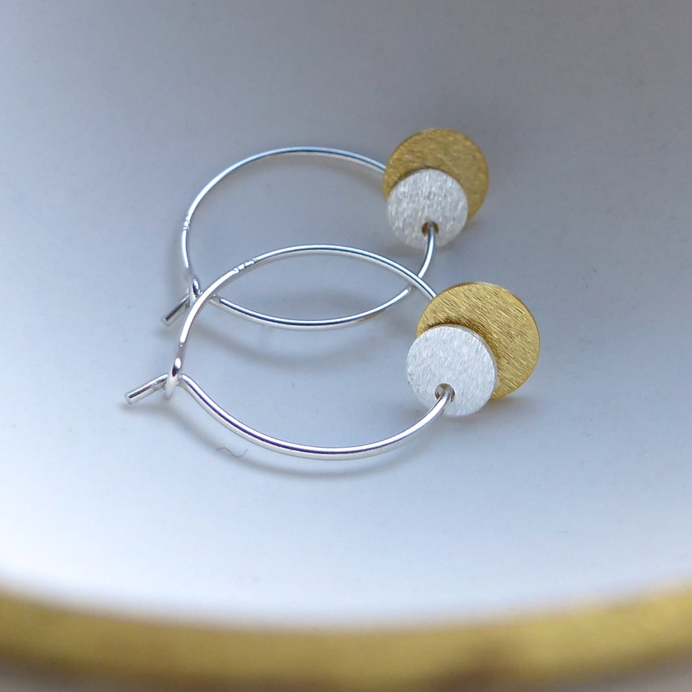 Image of Silver And Gold Double Disc Hoop Earrings
