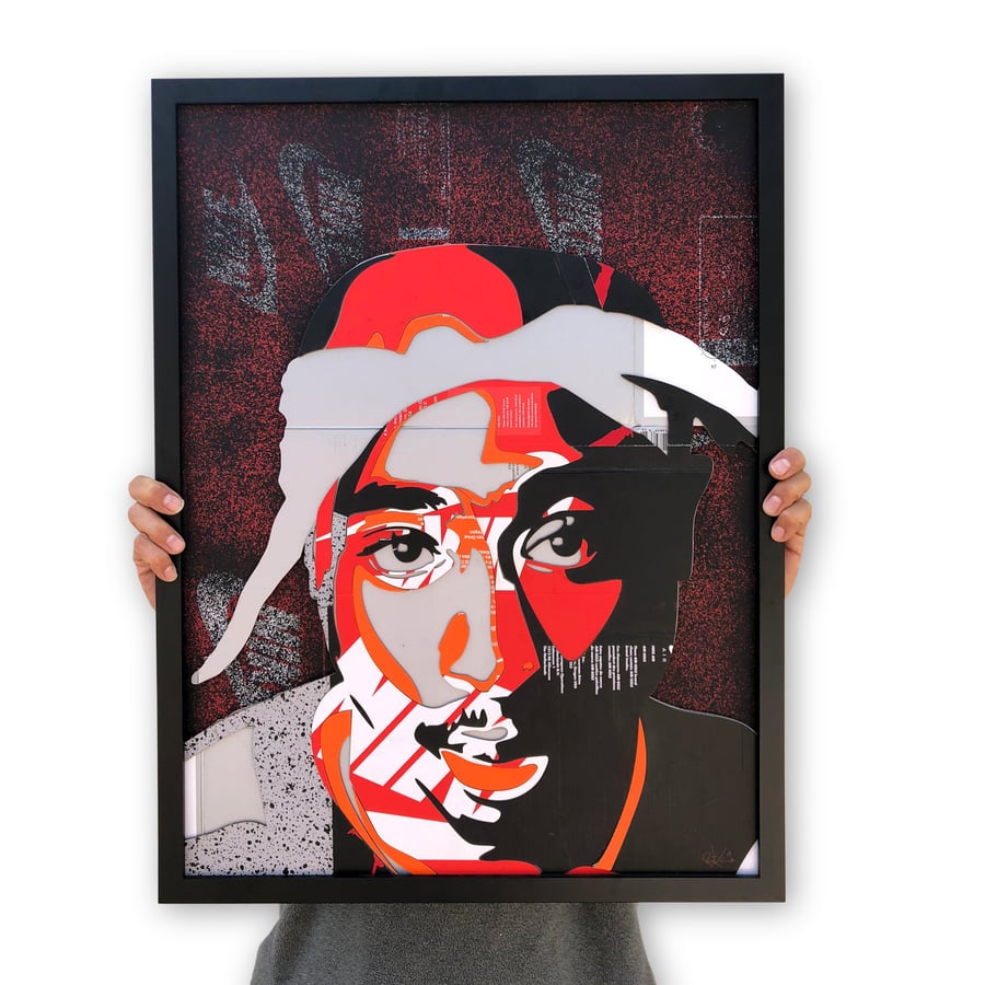 Image of  2 Pac Laser cut and stacked in frame