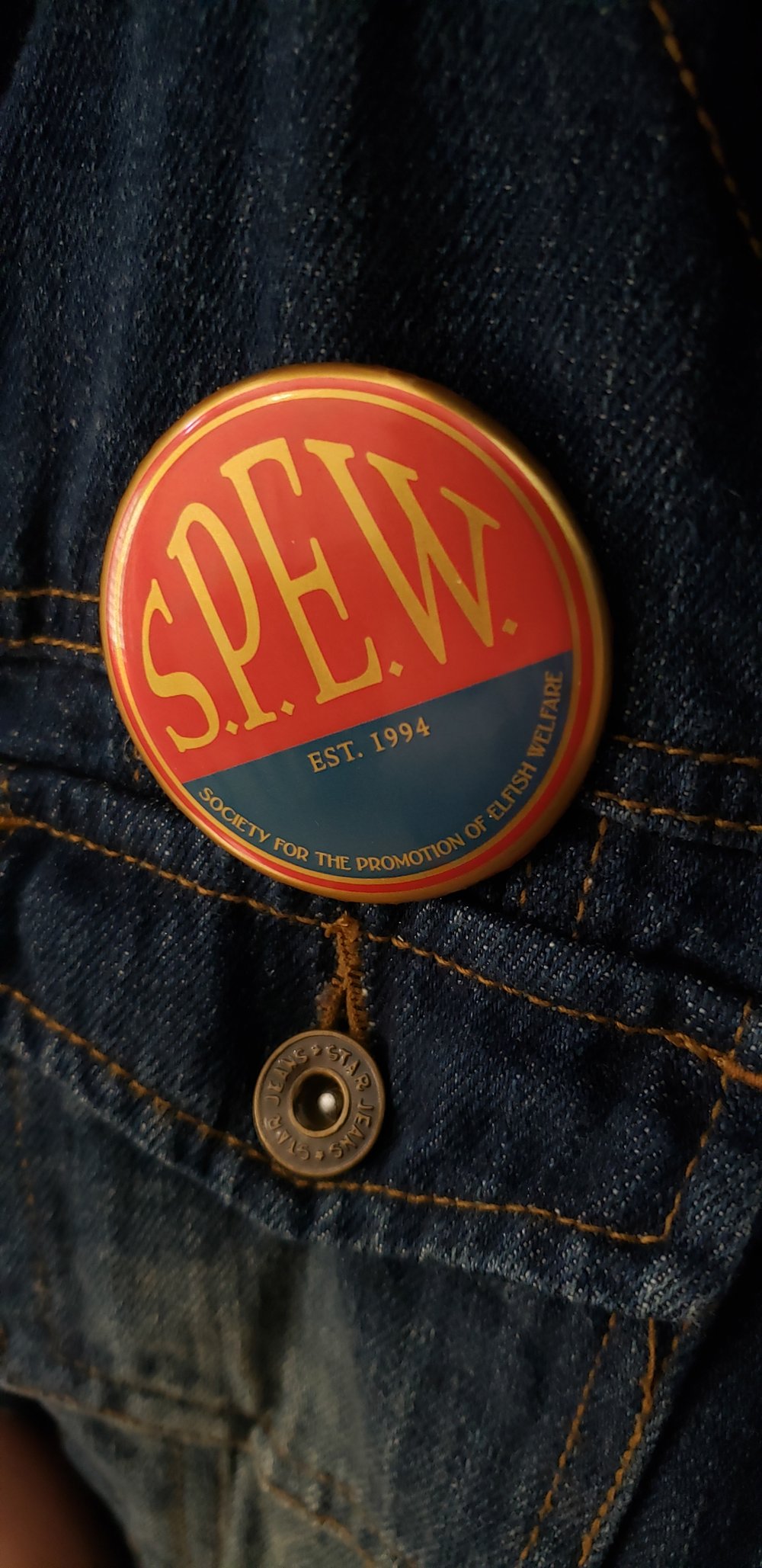 S. P. E. W. Badge