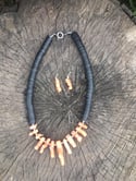 A Choice of 2 Black Flat Beaded Coral Necklace Sets:-