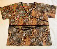 Image 1 of Scrub Top- Roar 