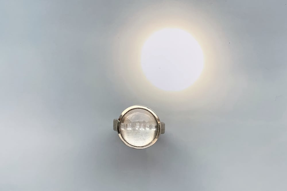 Image of "In peace" silver ring with rock crystal · IN PACE ·