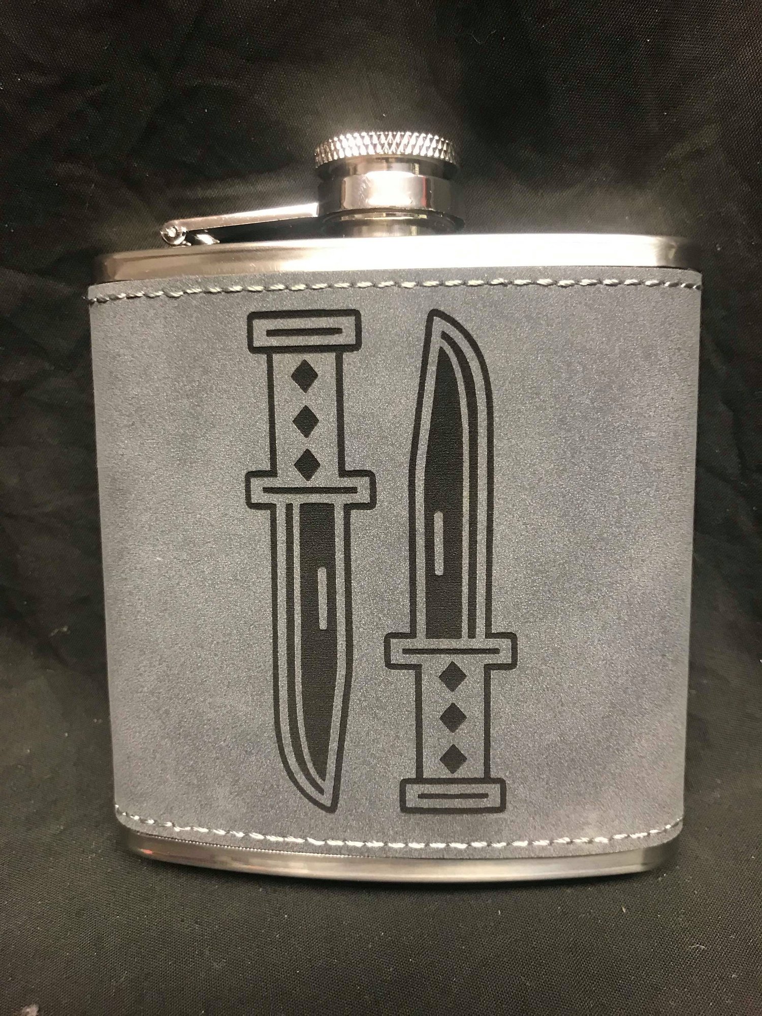 Image of Daggers hip flask 